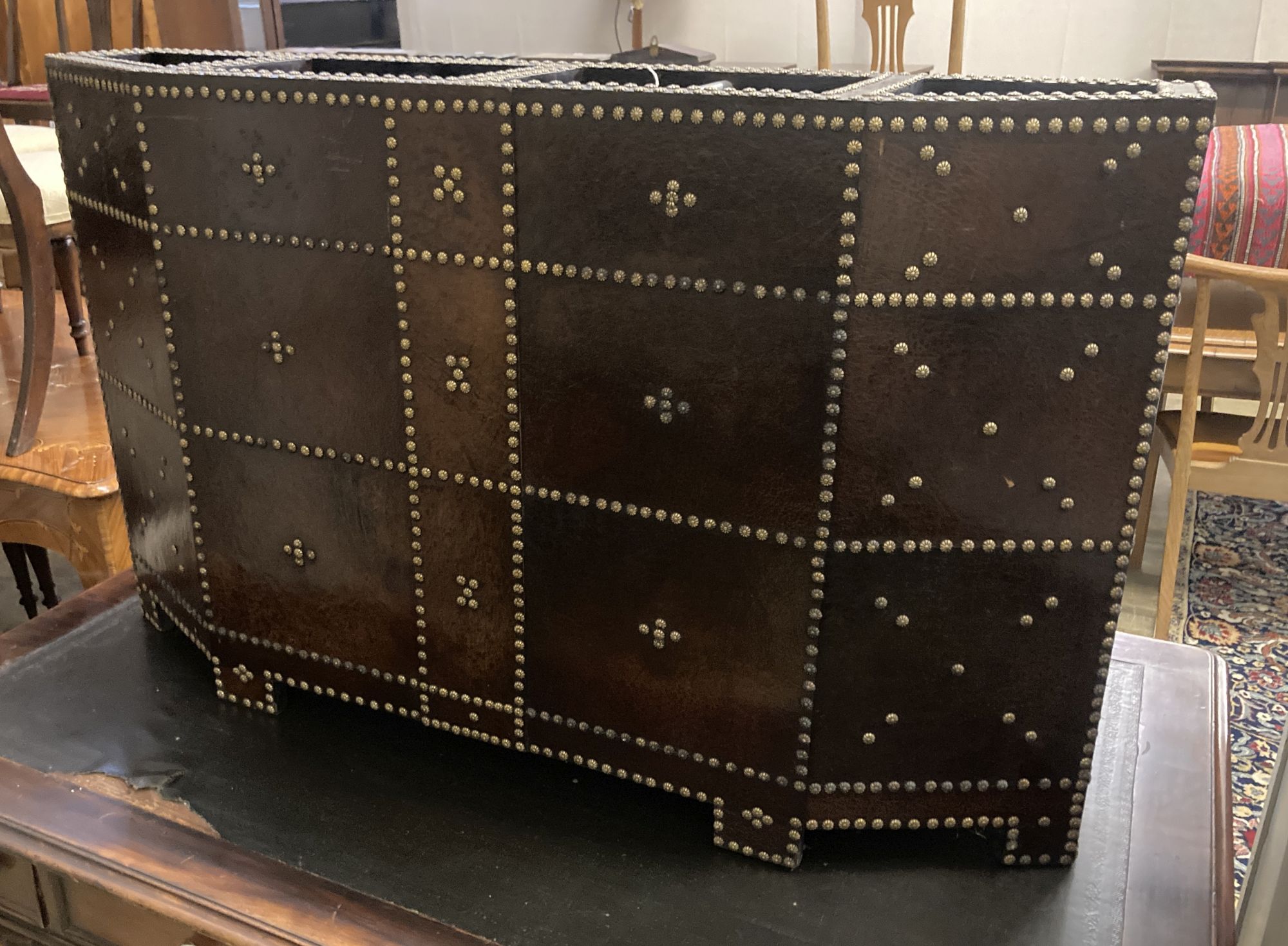 A brass studded leather mounted four division stick stand, width 122cm, depth 29cm, height 74cm